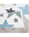 Kreminis kilimas su žvaigždėmis