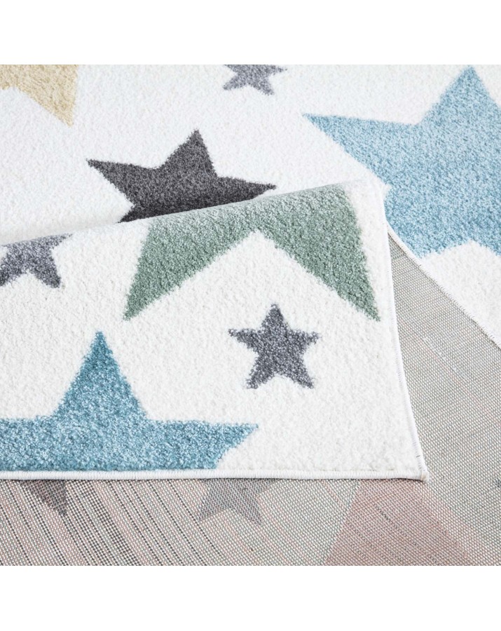 Kreminis kilimas su žvaigždėmis