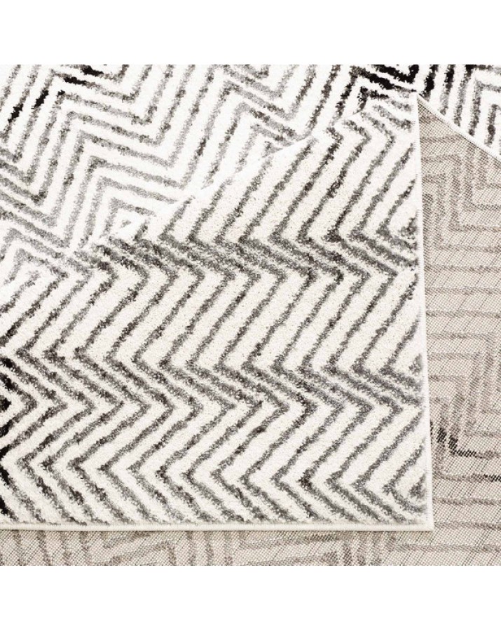 Modernus zigzagų raštų kilimas